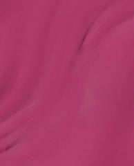 7th & Flower nail lacquer brush swatch showing a smooth, opaque deep magenta pink shade with subtle streaks, demonstrating the glossy coverage and vibrant color similar to OPI nail polish for manicures and pedicures.