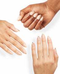 Three hands display Confetti Connection xPRESS/ON Nail Art with nude OPI polish and gold confetti tips, showcasing a chic nail polish gift set on a clean white background.
