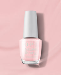 OPI Let Nature Take Its Quartz Nature Strong vegan nail lacquer bottle in a sheer pale pink shade with a white cap, centered on a soft pink background.