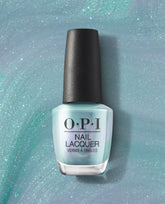 OPI Nail Lacquer bottle, Reality Check Ya Out, standing upright and showcasing a shimmery mint-to-seafoam green nail polish with a pearlescent shift on a glittery teal swirl backdrop—ideal for spring nail colors and green nail polish fans.