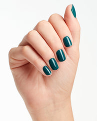 Manicured hand shows glossy teal nails painted with OPI AmazON...AmazOFF Nail Lacquer, a deep green nail polish perfect for spring nail colors, set against a clean white background.
