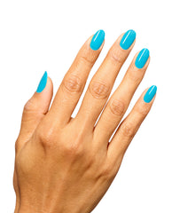 Hand displays glossy turquoise almond-shaped nails painted with OPI Infinite Shine Beach Party Teal Dawn nail polish on a clean white background.