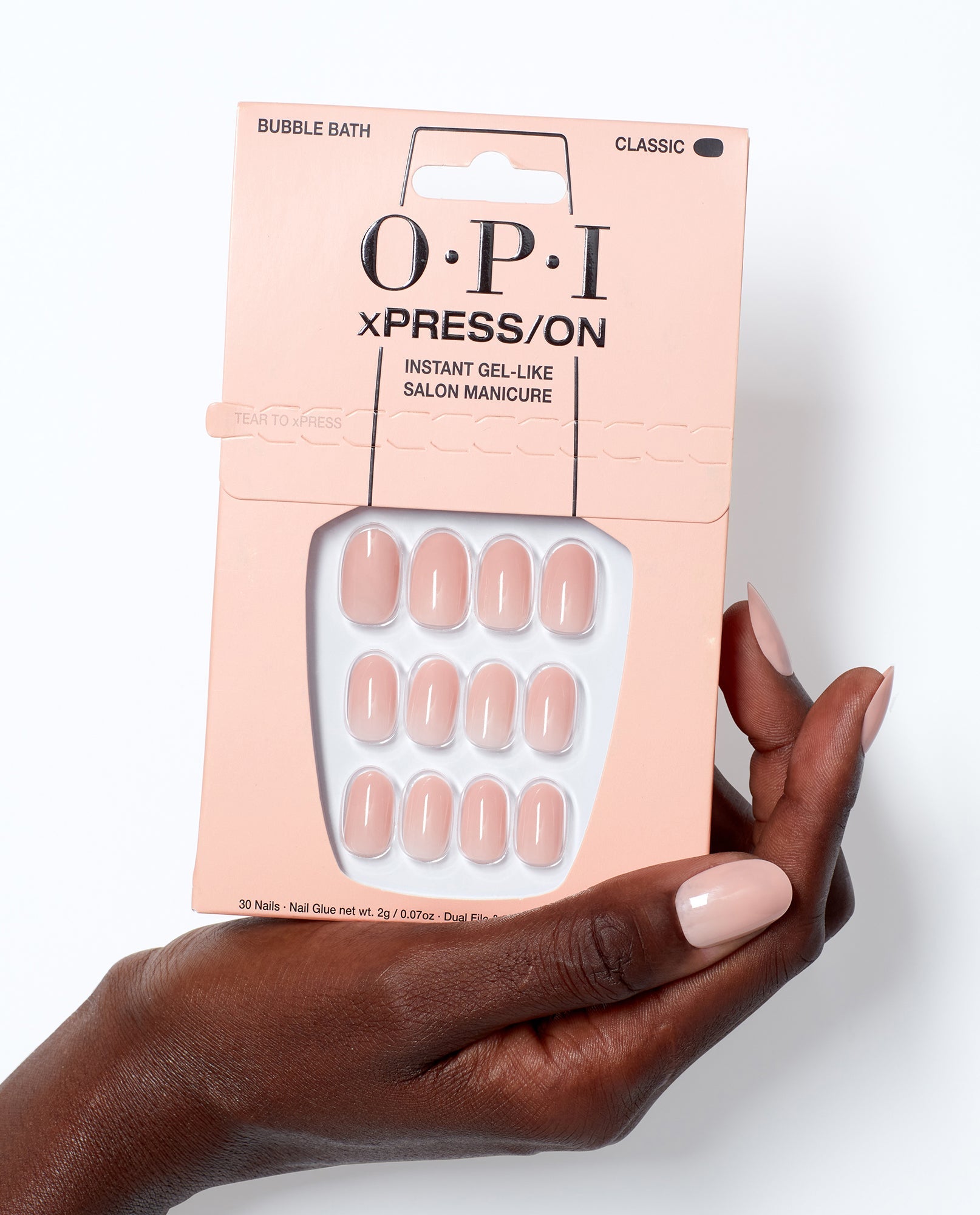OPI Bubble Bath - Short Nude Press-on Nails Hand and Product