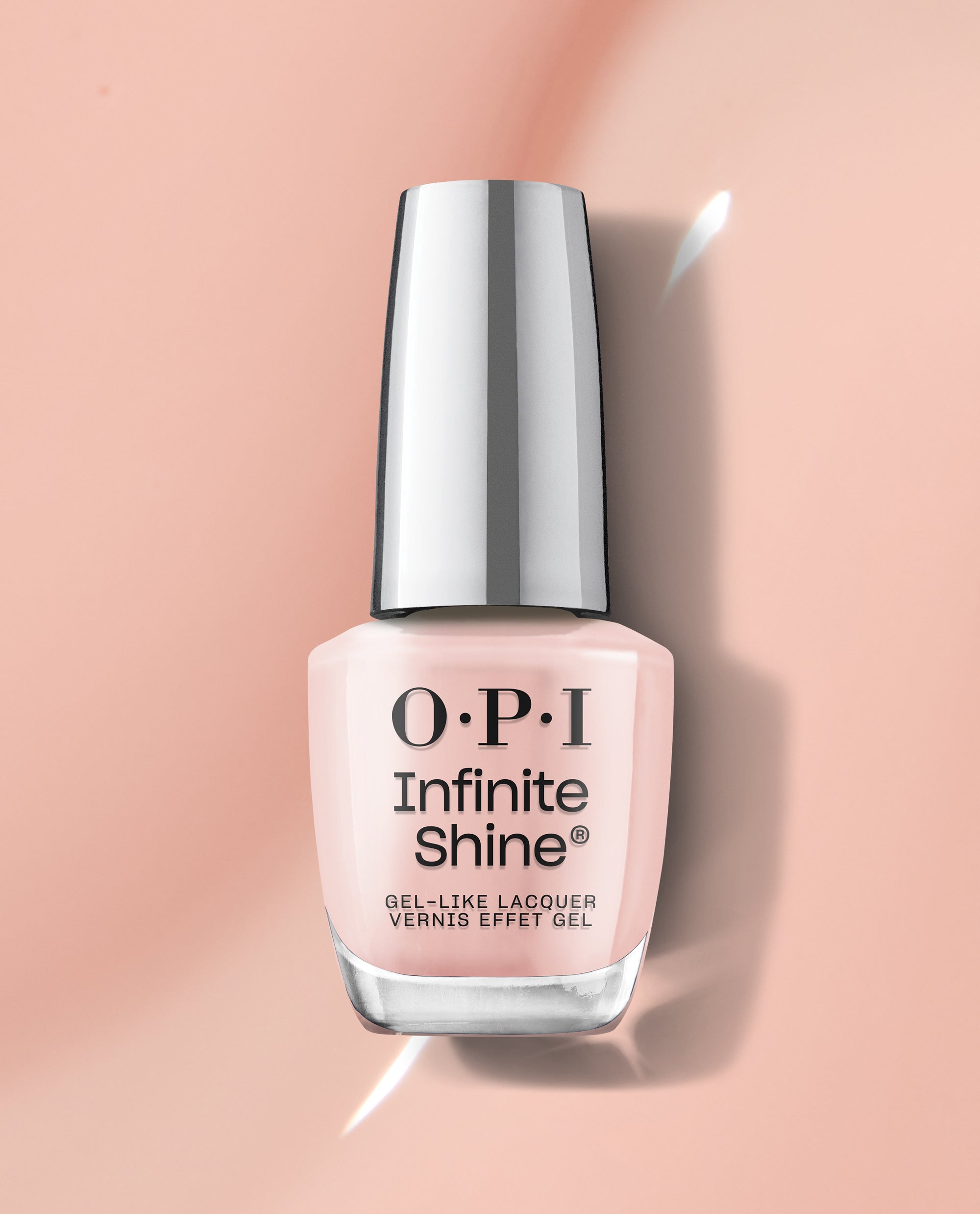 OPI Infinite Shine Bubble Bath® long-lasting pale pink nail polish bottle standing upright against a glossy nude background, ideal as an elegant OPI nail polish gift set for a soft, salon-quality manicure look.