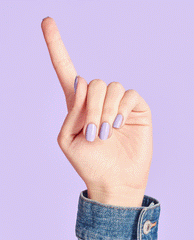Hand with neatly manicured nails painted in OPI nail polish shade “Don’t Toot My Flute” holds index finger up against a pastel lavender background, showcasing the glossy lilac nail lacquer color and smooth finish for a modern manicure look.