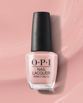 OPI nail polish bottle of Edinburgh-er & Tatties nail lacquer standing upright, showing its soft blush pink shade against a matching glossy pink background, highlighting the elegant neutral manicure color for US shoppers.