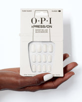 OPI Funny Bunny - Short White Press-on Nails Hand and Product