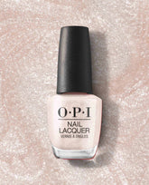 OPI nail polish bottle of Gemini and I nail lacquer standing upright, showcasing a soft shimmery pale pink shade against a matching glittery background, highlighting the elegant neutral manicure color for US shoppers.