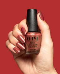 Ginger Snapped Brown Nail Polish Hand and Bottle