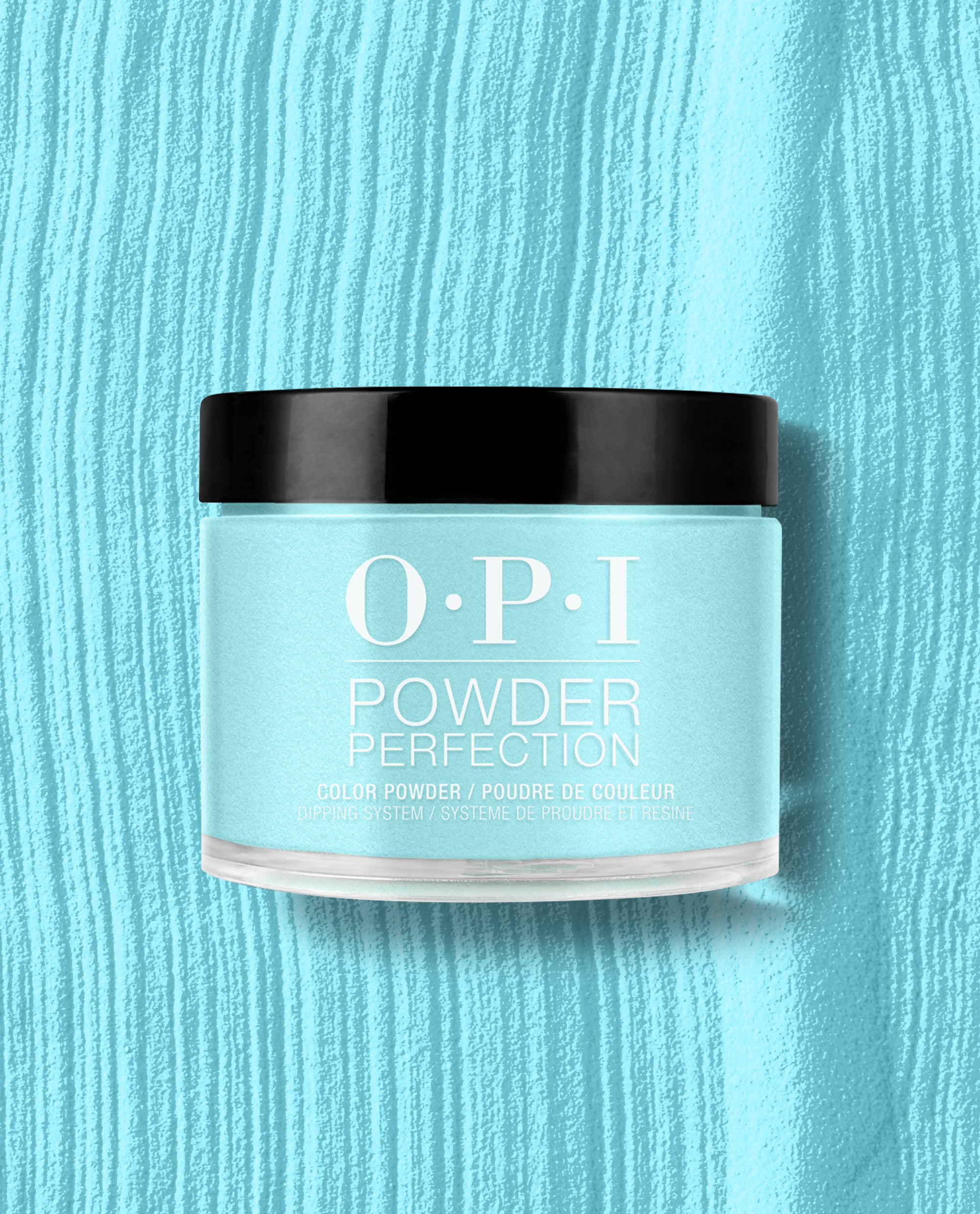 OPI Powder Perfection I’m Yacht Leaving dipping powder jar showing a bright aqua-blue shade on a matching textured backdrop—an OPI pick for spring nail colors that appeals to green nail polish fans.