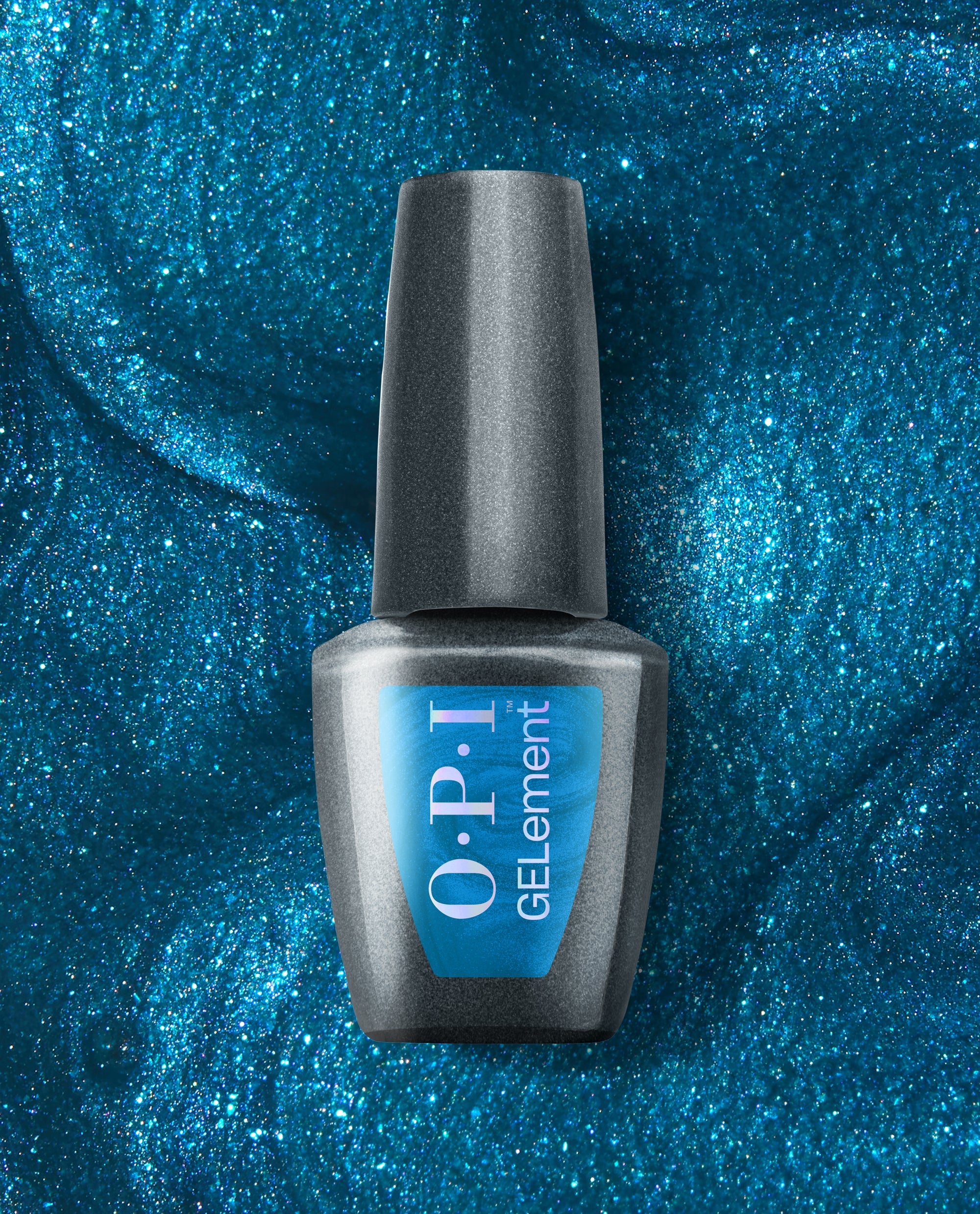 OPI I Sea You at-home gel nail polish bottle stands centered against a shimmering ocean-blue glitter background, featuring a dark metallic cap and blue label for a trending sea-inspired manicure.
