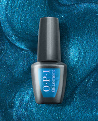 OPI I Sea You at-home gel nail polish bottle stands centered against a shimmering ocean-blue glitter background, featuring a dark metallic cap and blue label for a trending sea-inspired manicure.