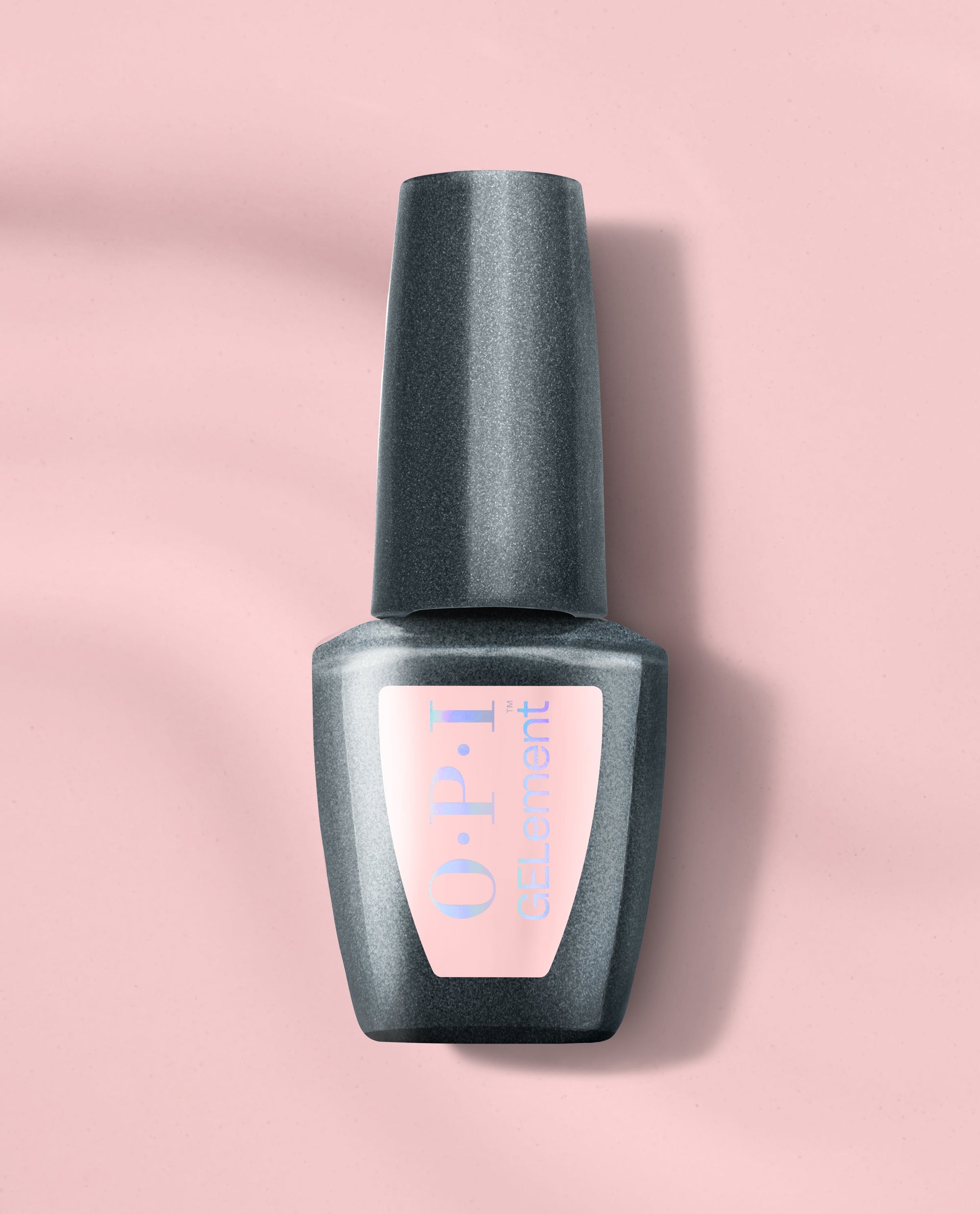 OPI I’m the Gloss! at-home gel nail polish bottle in shimmering charcoal gray stands upright on a soft pink background, showcasing a trending salon-style gel manicure shade.