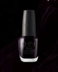 OPI Lincoln Park After Dark nail lacquer bottle displays a deep black-purple polish with a textured black cap against a dark satin background, a dramatic choice for fall nail colors.