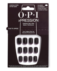 OPI xPRESS/ON Lincoln Park After Dark press-on nails display glossy deep plum-black classic gel-like tips in retail packaging, a dramatic choice for fall nail colors with up to 14 days of wear.