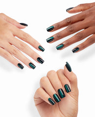 Model for Daze xPRESS/ON Effects press-on nails displaying glossy emerald chrome square tips on multiple hands against a white backdrop, showcasing green nail polish and spring nail colors with an easy salon look from OPI.