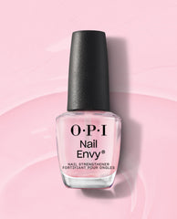 OPI Nail Envy Pink To Envy Nail Strengthener bottle standing upright, showcasing its sheer pink treatment formula and black cap on a glossy pastel pink background, perfect addition to an OPI nail polish gift set.
