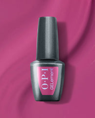 OPI Pompeii Me in Nails at-home gel nail polish bottle with a metallic charcoal finish and pink label, displayed on a vibrant magenta background for bold fall nail colors.