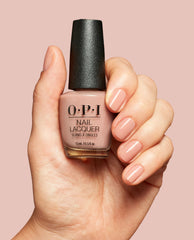 Put it in Airplane Mode Nude Brown Crème Nail Polish Hand and Product