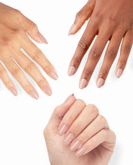 Three hands with neatly manicured nails showcase OPI Put it in Neutral, a soft beige-pink shade from the On Point nail polish gift set, against a clean white background highlighting its glossy neutral finish on different skin tones.