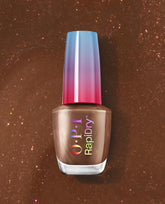 OPI RapiDry Awe of a Sudden bronze shimmer nail polish bottle with a blue-to-pink cap, displayed on a sparkling brown backdrop for fall nail colors.