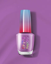 OPI RapiDry Bright Back at It lavender-purple nail polish bottle with a blue-to-red gradient cap, standing on a purple background for vibrant fall nail colors.