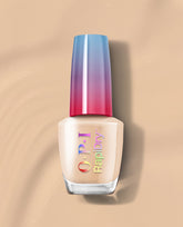 OPI RapiDry nail polish in Can’t Hardly Wait, a creamy nude shade, stands upright with a blue-to-pink gradient cap on a beige background for a trending quick-dry manicure.