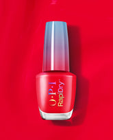 OPI RapiDry nail polish in Haul Sass stands upright, showcasing a vibrant red fall nail color with a metallic gradient cap on a glossy red background.