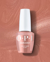 OPI GelColor Route Beer Float gel nail polish bottle in a shimmering warm rose-brown shade, displayed on a matching glossy swatch for fall nail colors.