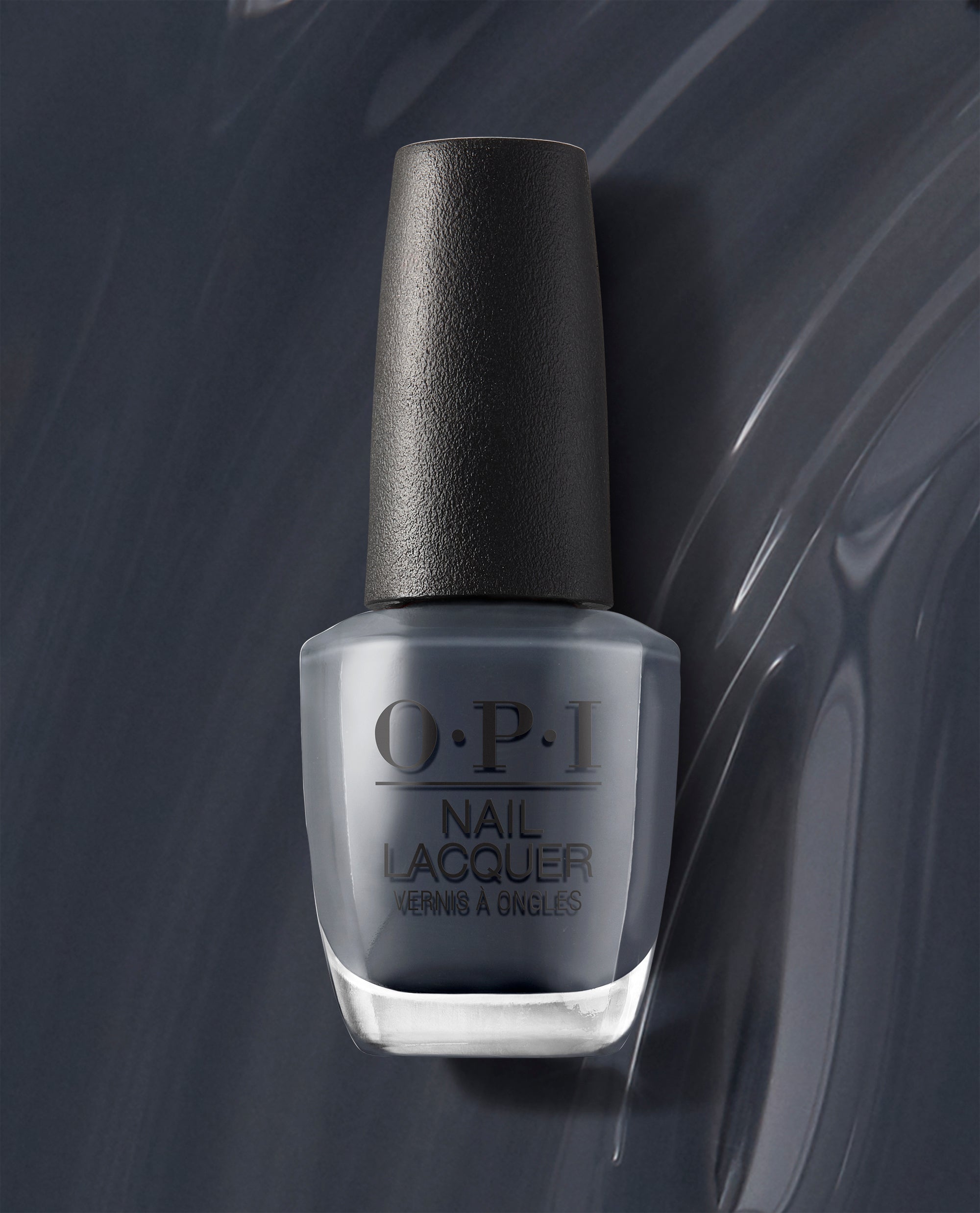OPI nail polish bottle of Rub-a-Pub-Pub nail lacquer standing upright, showing a deep smoky gray shade with a black textured cap, set against a glossy swirled gray background highlighting the cool-toned color.