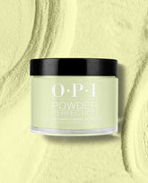 OPI Powder Perfection Clear Your Cash dipping powder jar with black lid displaying a soft pastel mint green shade, set on a matching powder-textured backdrop; perfect for green nail polish looks and fresh spring nail colors from OPI.