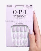 OPI xPRESS/ON Polly Want a Lacquer? long press-on nails in soft lavender, shown in packaging with a matching manicured hand, offering gel-like fall nail colors with 14-day wear.