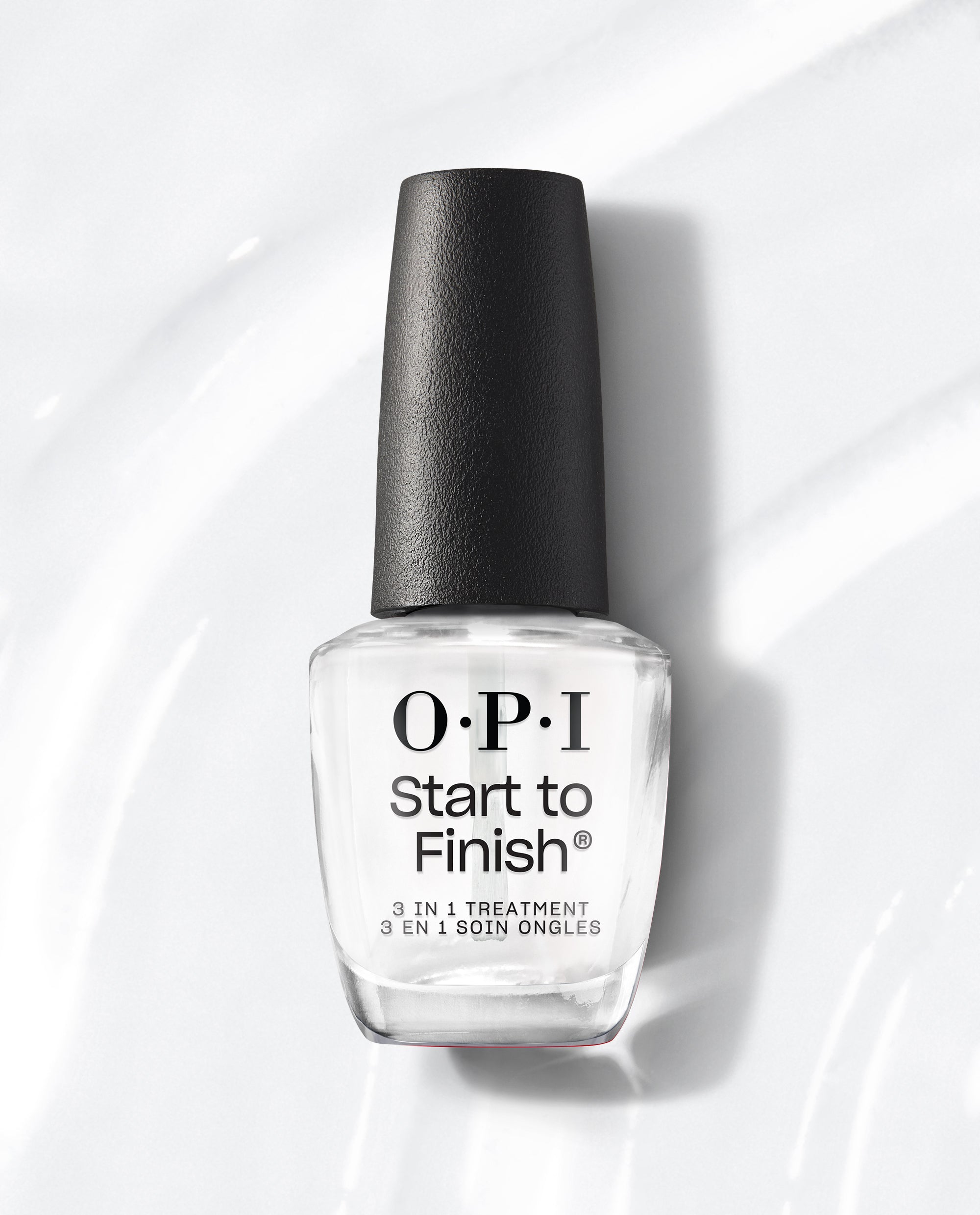 OPI Start to Finish 3-in-1 Treatment clear nail polish bottle standing upright, showing black cap and labeled top and base coat on a glossy white background, ideal as an OPI nail polish gift set or everyday nail care staple.