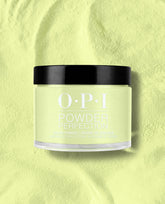 OPI Powder Perfection Summer Monday-Fridays dipping powder in pastel lime green, jar with black lid standing on a matching loose powder backdrop, showcasing green nail polish ideal for spring nail colors by OPI.
