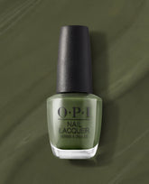 OPI Suzi – The First Lady of Nails Nail Lacquer bottle standing upright, showcasing a rich olive green nail polish against a matching swirled backdrop, a chic pick for spring nail colors from OPI with frosted glass and a textured black cap.