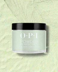 OPI Powder Perfection Taurus-t Me dipping powder jar displaying a pale mint green shimmer for green nail polish and spring nail colors, set on a matching speckled powder background with OPI logo and black lid in view.