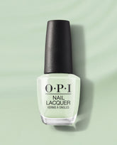 OPI That’s Hula-rious! Nail Lacquer bottle displays pastel mint green nail polish, standing upright with a textured black cap on a matching mint backdrop, highlighting fresh spring nail colors from OPI.