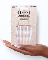 OPI Throw Me a Kiss - Long Shimmery Pink Press-on Nails Hand and Product