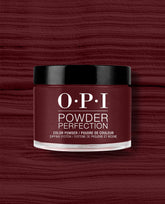 OPI Powder Perfection Vampire State Building dipping powder jar in deep burgundy red with black lid, shown against a matching textured swatch for rich fall nail colors.