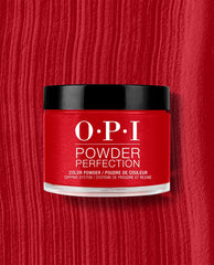 OPI Powder Perfection Vodka & Caviar dipping powder jar in rich red with a black lid, centered on a textured red nail color swatch for bold fall nail colors.