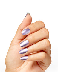 Hand with neatly manicured oval nails wearing OPI nail polish in You’ve Got Nail, a metallic lavender nail lacquer, shown against a white background to highlight the smooth, high-shine finish on each nail.