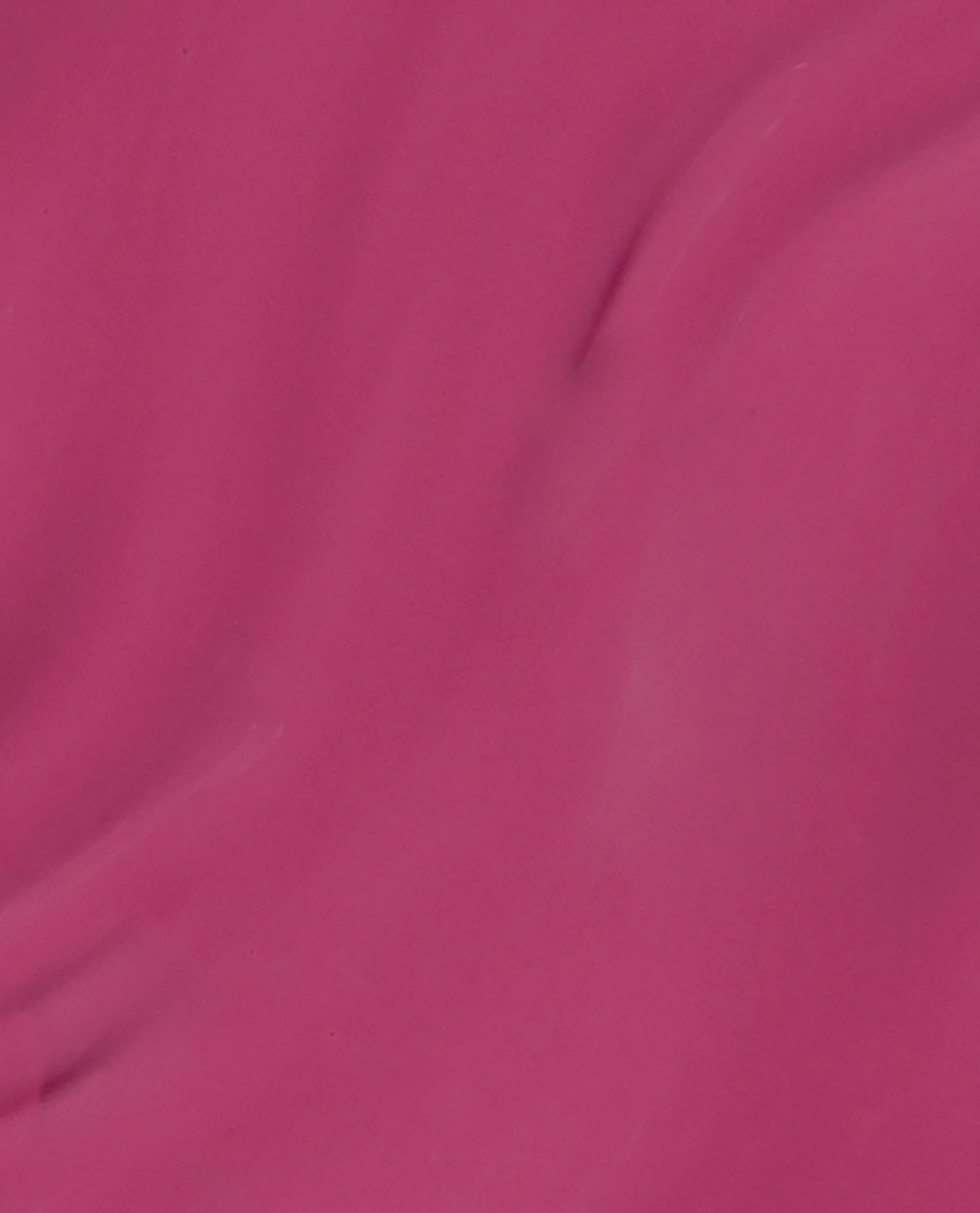 7th & Flower nail lacquer brush swatch showing a smooth, opaque deep magenta pink shade with subtle streaks, demonstrating the glossy coverage and vibrant color similar to OPI nail polish for manicures and pedicures.
