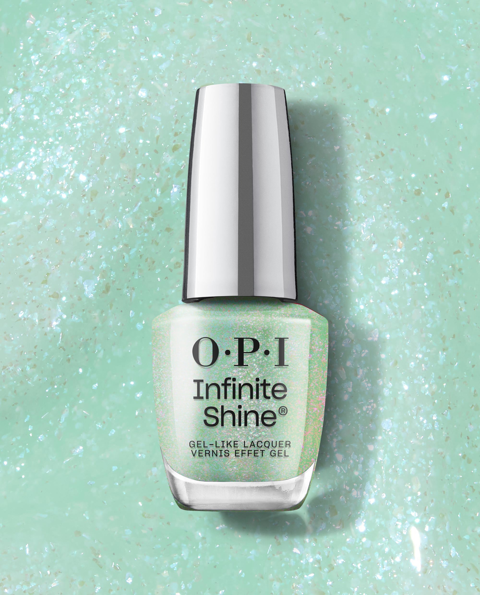 OPI Infinite Shine Teals Familiar bottle stands upright, showing mint-teal shimmer green nail polish with iridescent flecks on a matching swatch backdrop; gel-like, long-wear finish—fresh spring nail colors from OPI.