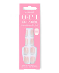 OPI On Point La Vie en Rosé instant press-on nails in sheer nude pink sit in a bright pink retail box with window display and up to 14 days of wear claim.