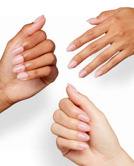 Hands model OPI’m Just a Whirl Sticking Point nails in a trending glossy pale pink almond manicure with delicate rose swirl line art on a clean white studio background.