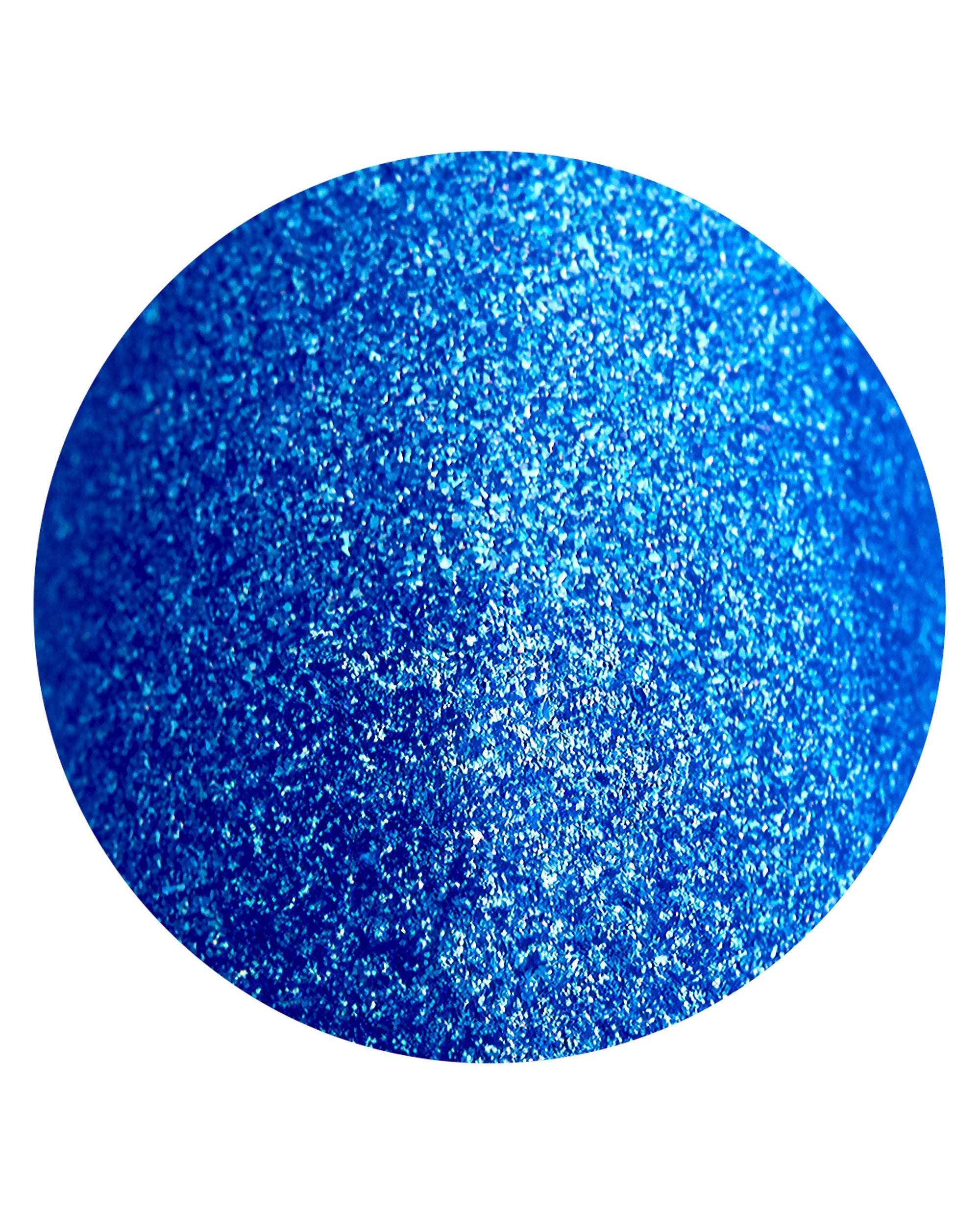 OPI Send Me Into Glo-Rbit Sticking Point swatch showing vivid electric blue glitter with metallic shimmer in a circular close-up on a white background.