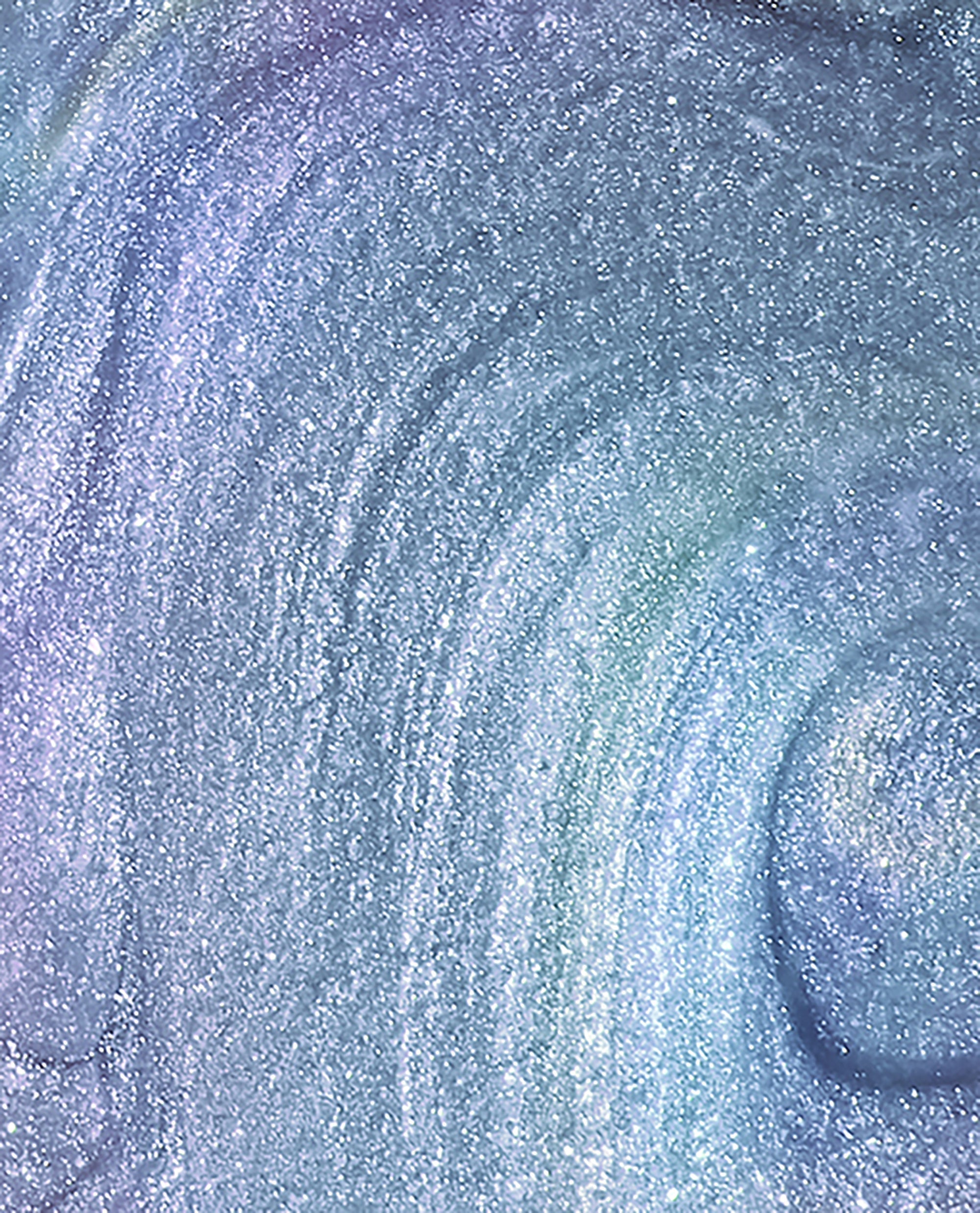 Shimmery lavender-blue Angels Flight to Starry Nights OPI nail polish swirling in a close-up brushstroke, showing fine glitter and iridescent sheen across the smooth lacquer surface.