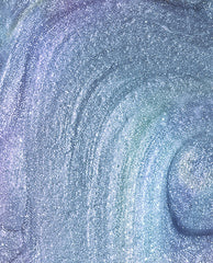 Shimmery lavender-blue Angels Flight to Starry Nights OPI nail polish swirling in a close-up brushstroke, showing fine glitter and iridescent sheen across the smooth lacquer surface.