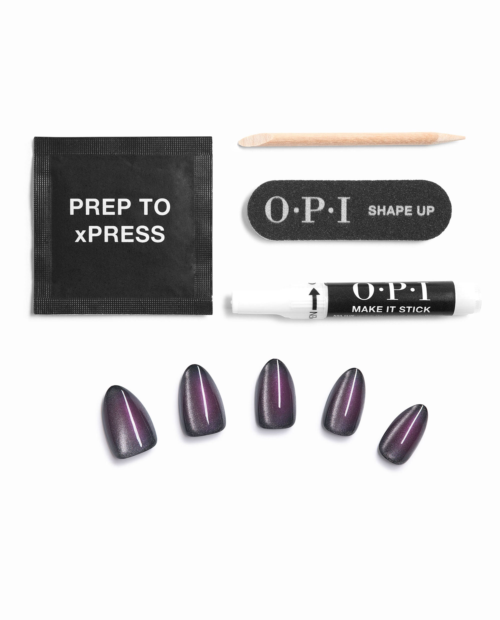 OPI Aura After Dark xPRESS/ON press-on nails in shimmery black-purple fall nail colors are arranged with a prep pad, wooden cuticle stick, Shape Up file, and Make It Stick nail glue on a white background.