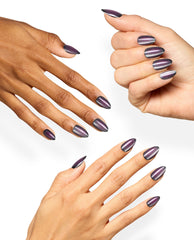 Hands model OPI Aura After Dark xPRESS/ON almond press-on nails in a dark purple magnetic shimmer finish, showcasing dramatic fall nail colors on a clean white background.